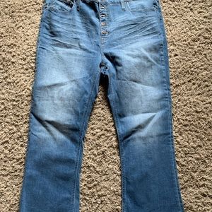 J Crew flare crop button fly jean with cut hem.